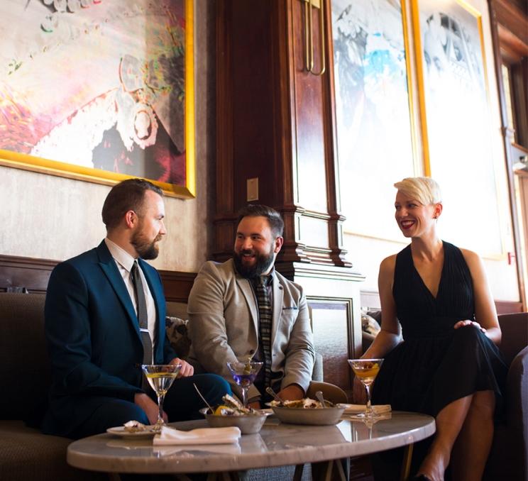 A group enjoys martinis at Q at the Empress in Victoria, BC