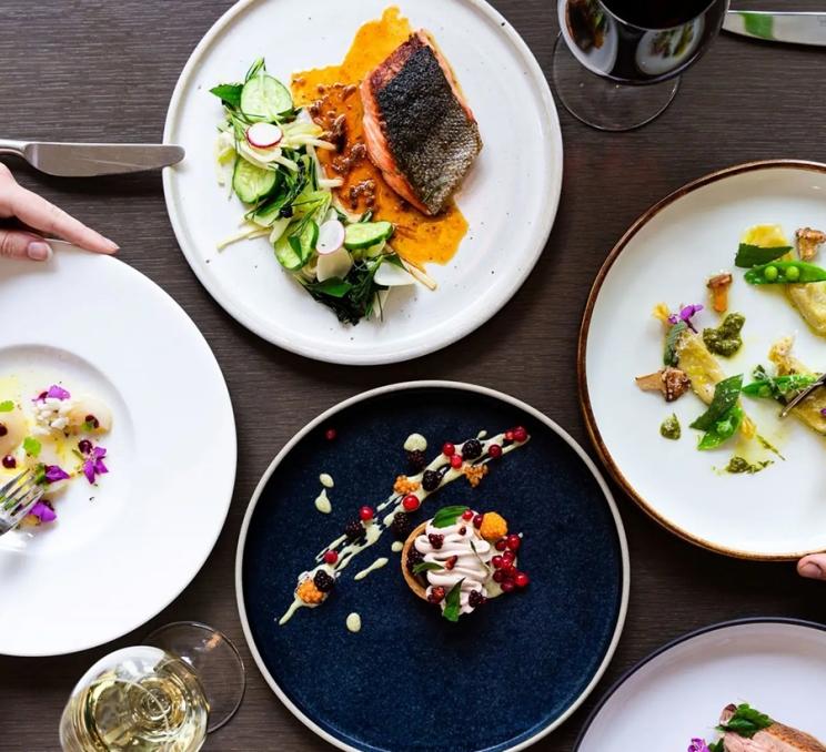 A spread of plates at The Courtney Room in Victoria, BC