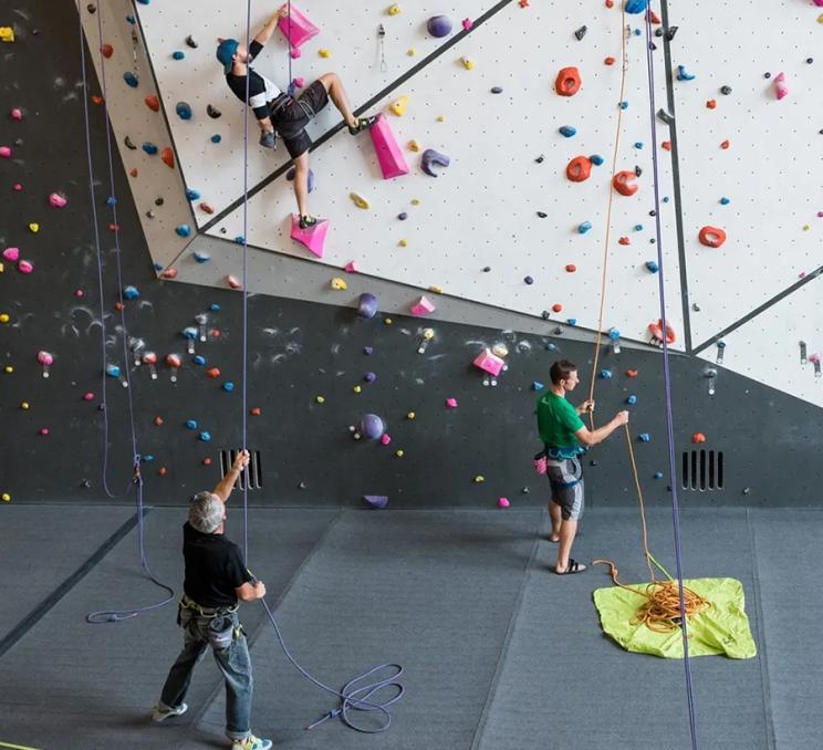 Climbers belay at Crag X Climbing Gym in Victoria, BC