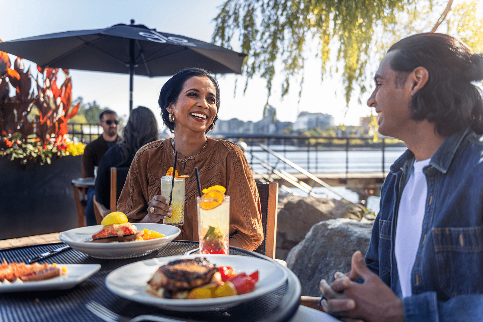 A young couple dines at Glo Restaurant Lounge