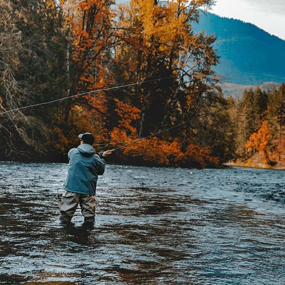 a person fly fishing