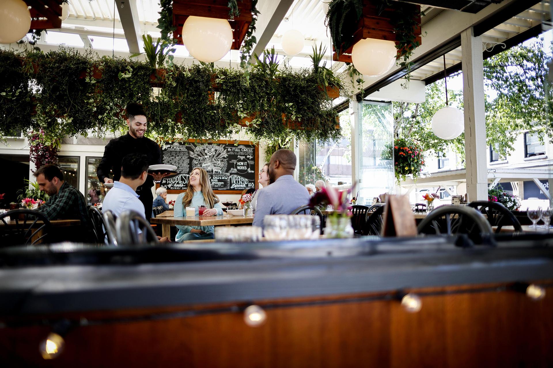 Group enjoy dining at 10 Acres Bistro