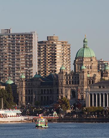 A Harbour Ferry crosses the Inner Harbour in Victoria, BC